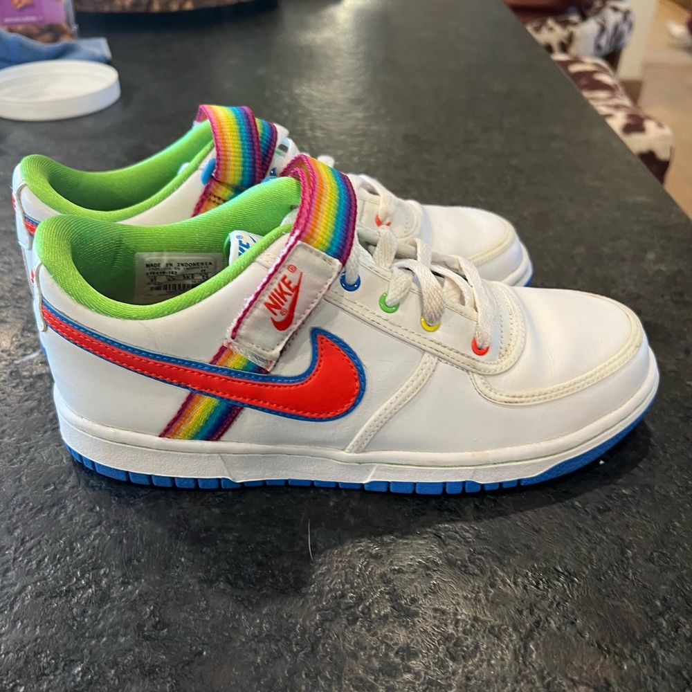 Rainbow Nike shoes.